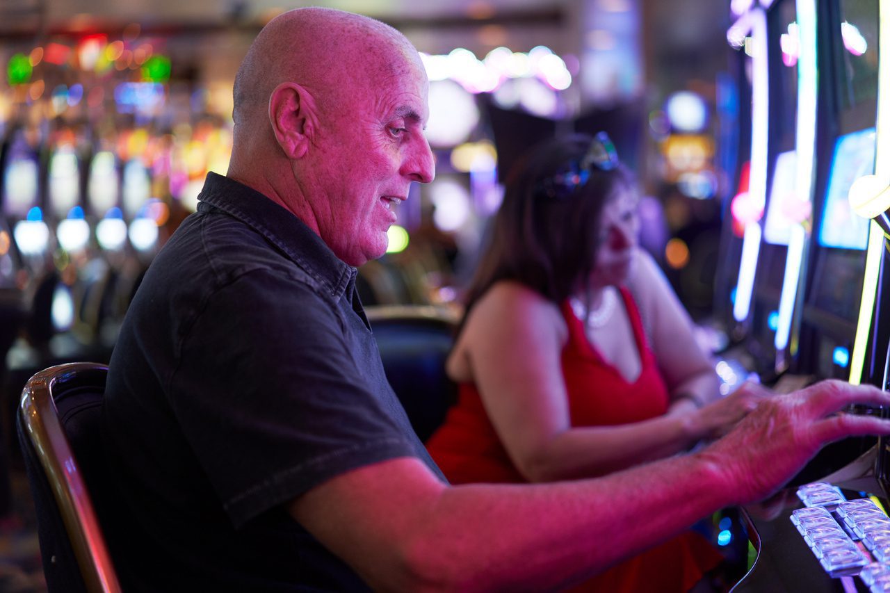 A man and woman are playing video games.